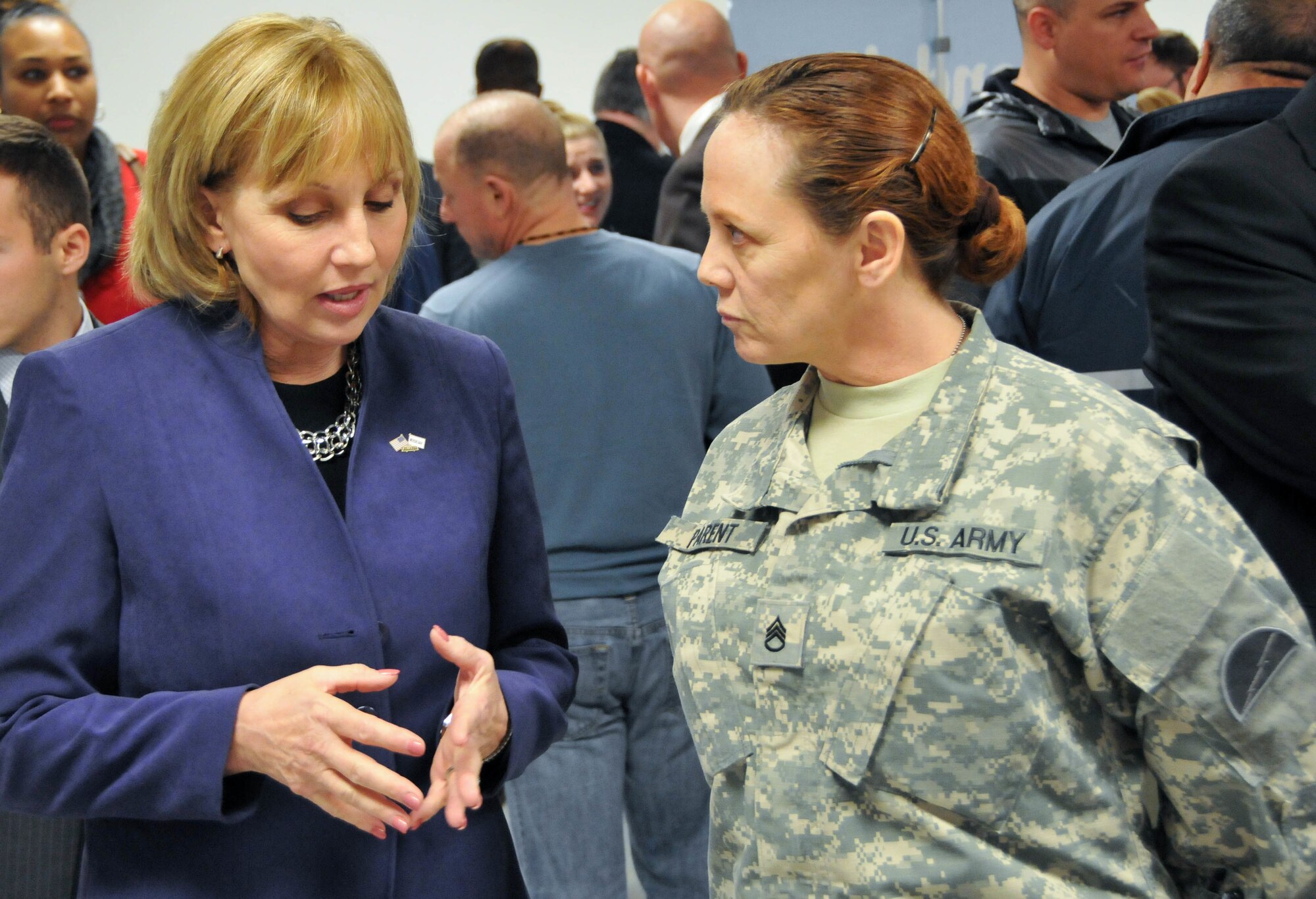 New Jersey Lt. Gov. Kim Guadagno, left, speaks with Staff Sgt. Kathleen Parent, operations noncommissioned officer with the Army Reserve's 78th Training Division, during the Hiring Our Heroes job fair Jan. 21 at the Timmermann Conference Center at Joint Base McGuire-Dix-Lakehurst, N.J. The Army Reserve was a key partner in the event, which featured more than 80 employers, schools and service providers, who offered employment and education opportunities to attendees. (U.S. Army photo by Staff Sgt. Shawn Morris/Released)