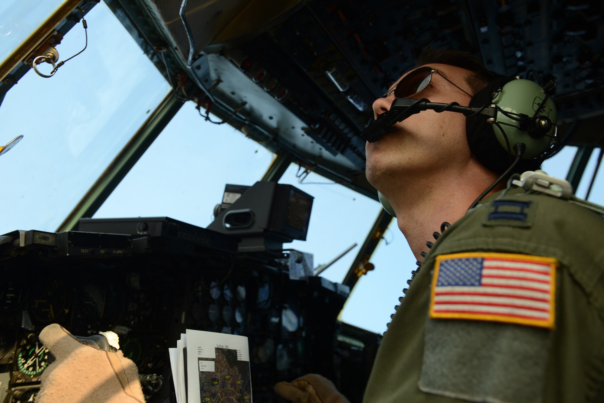 U.S. Air Force Capt. Travis Wilkes, a C-130H aircraft pilot assigned to the 36th Airlift Squadron, Yokota Air Base, Japan, executes turn during Exercise COPE SOUTH near Sylhet, Bangladesh, Jan. 25, 2015. COPE SOUTH is a Pacific Air Forces-sponsored, bilateral tactical airlift exercise conducted in Bangladesh, with a focus on cooperative flight operations, day and night low-level navigation, tactical airdrop, and air-land missions as well as subject-matter expert exchanges in the fields of operations, maintenance and rigging disciplines. (U.S. Air Force photo by 1st Lt. Jake Bailey/Released)
