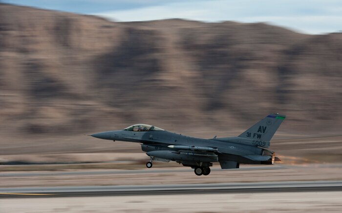 A U.S. Air Force F-16 Fighting Falcon assigned to the 555th Fighter Squadron from Aviano Air Base, Italy, takes off during Red Flag 15-1 at Nellis Air Force Base, Nev., Jan. 26, 2015. Red Flag provides combat training in a degraded and operationally limited environment making the training missions as realistic as possible. (U.S. Air Force photo by Senior Airman Thomas Spangler)