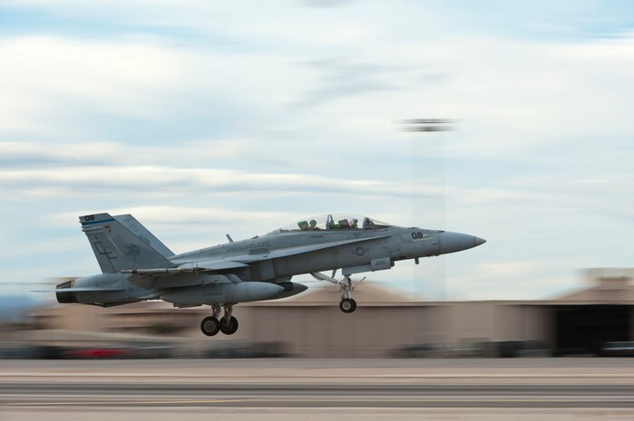 A U.S. Marine Corps F/A-18D Hornet assigned to Marine Fighter Attack Squadron 225 from Marine Corps Air Station Miramar, Calf., takes off during Red Flag 15-1 at Nellis Air Force Base, Nev., Jan 26, 2015. Red Flag involves a variety of attack, fighter, bomber, reconnaissance, electronic warfare, airlift support and search and rescue aircraft. (U.S. Air Force photo by Senior Airman Thomas Spangler)