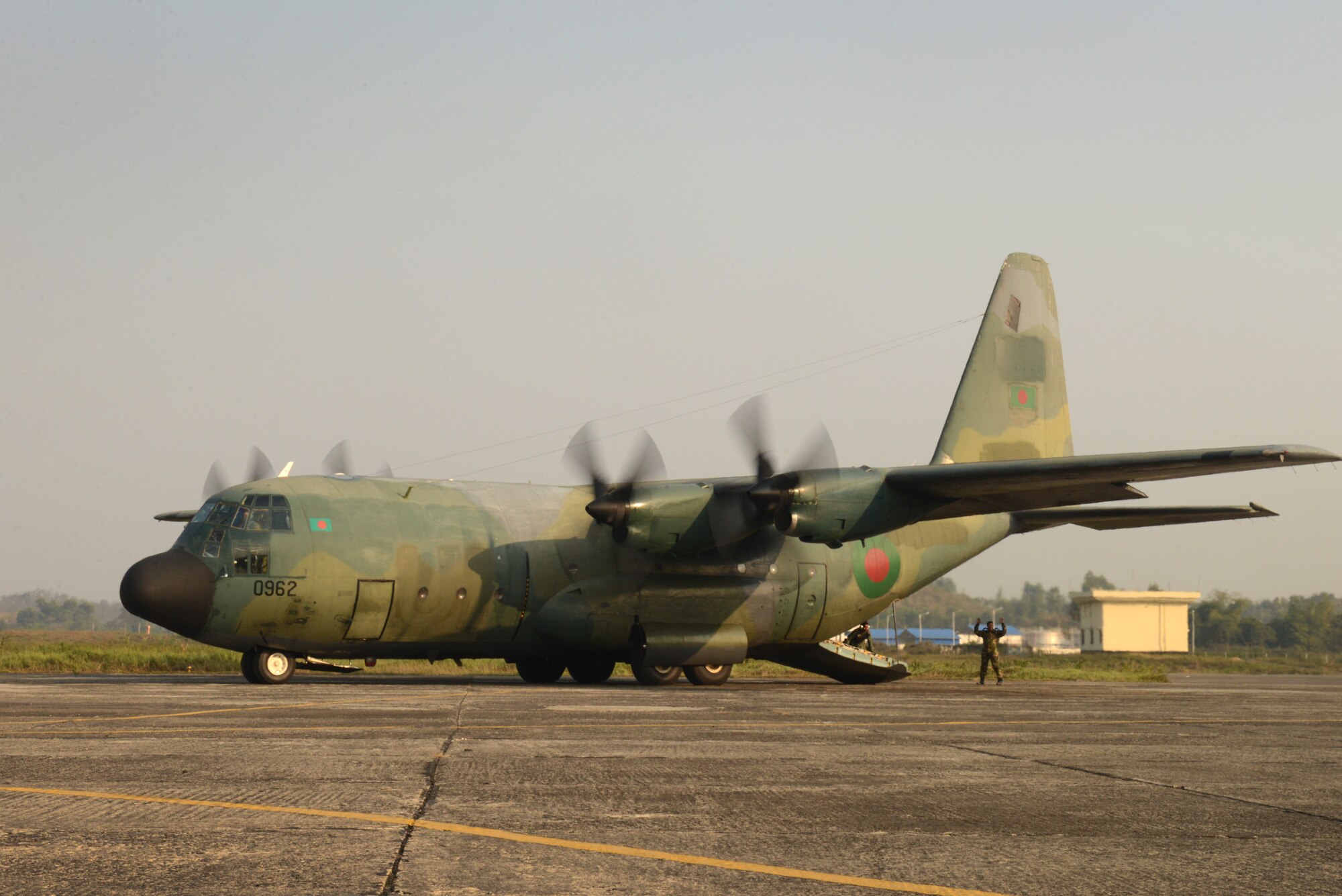 A Bangladesh Air Force C-130B prepares to take off from Sylhet International Airport for a personnel drop mission during Exercise COPE SOUTH, Jan. 25, 2015. COPE SOUTH is a Pacific Air Forces-sponsored, bilateral tactical airlift exercise conducted in Bangladesh, with a focus on cooperative flight operations, day and night low-level navigation, tactical airdrop, and air-land missions as well as subject-matter expert exchanges in the fields of operations, maintenance and rigging disciplines. (U.S. Air Force photo by 1st Lt. Jake Bailey/Released)