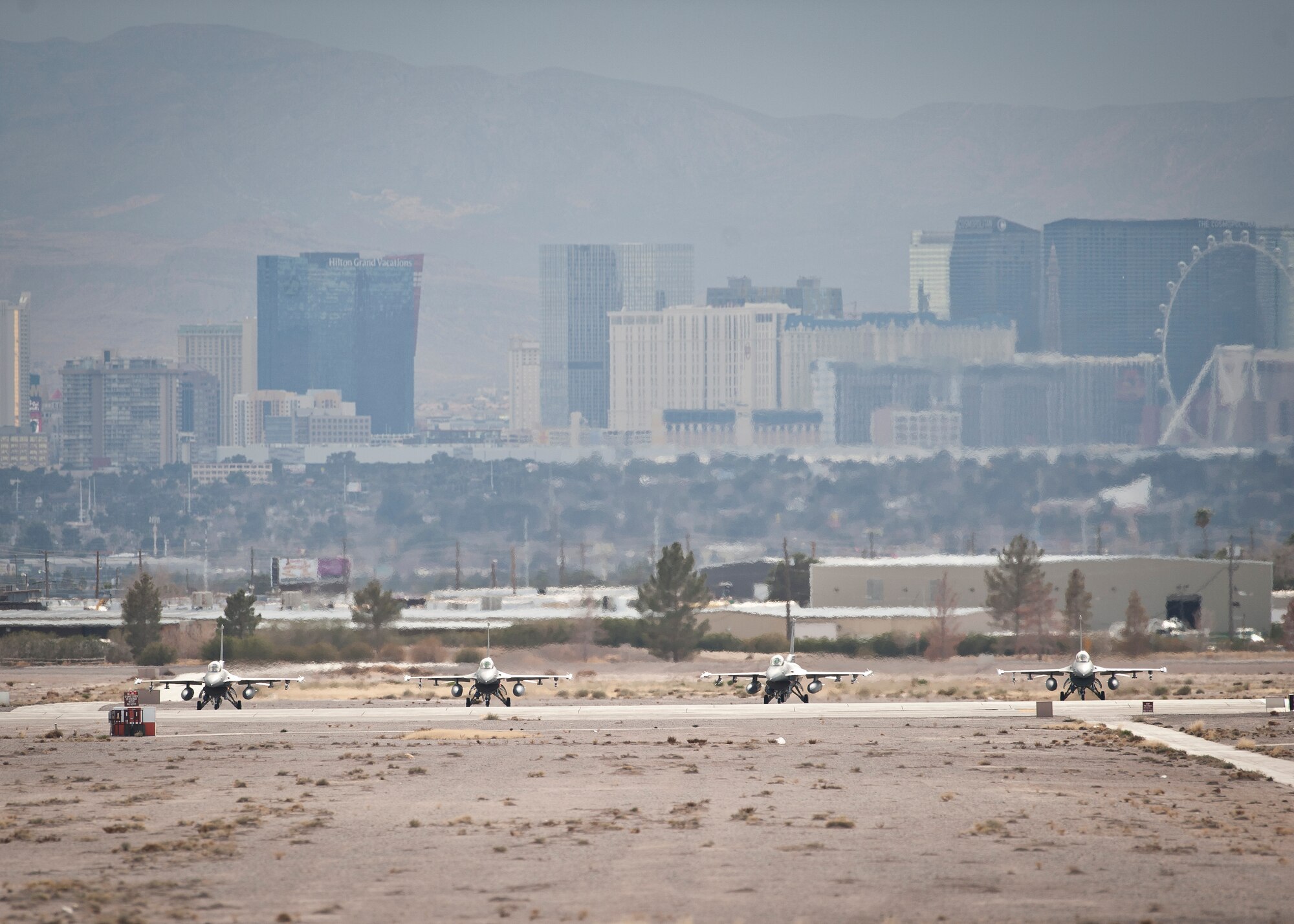 Four F-16 Fighting Falcons assigned to the 175th Fighter Squadron, Joe Foss Air National Guard Station, Sioux Falls, S.D., prepare to launch during Red Flag 15-1 at Nellis Air Force Base, Nev., Jan. 26, 2015. Red Flag is a realistic combat exercise involving U.S. and allied air forces conducting training operations on the 15,000 square mile Nevada Test and Training Range. (U.S. Air Force photo by Staff Sgt. Siuta B. Ika)