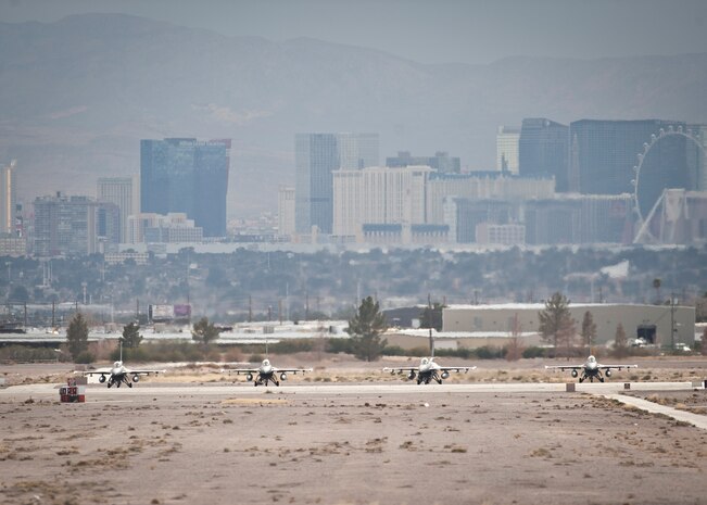 Four F-16 Fighting Falcons assigned to the 175th Fighter Squadron, Joe Foss Air National Guard Station, Sioux Falls, S.D., prepare to launch during Red Flag 15-1 at Nellis Air Force Base, Nev., Jan. 26, 2015. Red Flag is a realistic combat exercise involving U.S. and allied air forces conducting training operations on the 15,000 square mile Nevada Test and Training Range. (U.S. Air Force photo by Staff Sgt. Siuta B. Ika)
