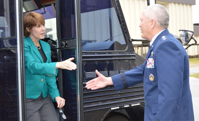 TYNDALL AIR FORCE BASE, Fla - U.S. Rep. Gwen Graham of Florida greets Lt. Gen. William Etter, Continental U.S. Aerospace Defense Region Commander, upon her arrival at the 601st Air Operations Center Jan. 23. During her visit there, the congresswoman received a mission briefing and toured the operations floor where day-to-day air-defense operations occur around the clock 365 days a year. (U.S. Air Force photo by Mary McHale/Released)