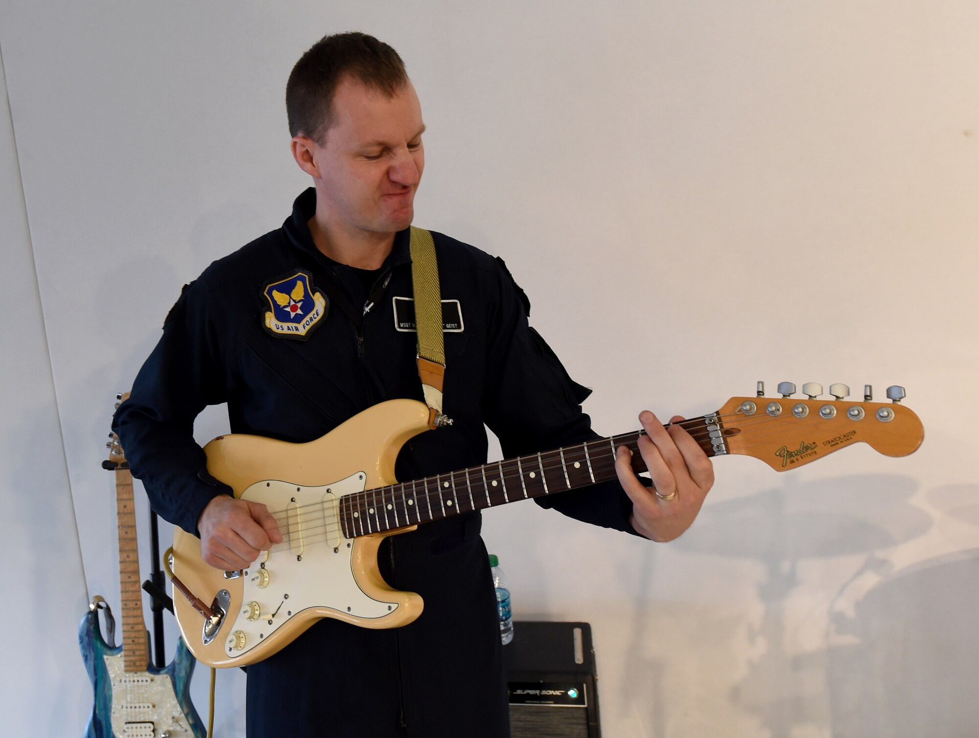 Master Sgt. Matthew Geist, the U.S. Air Force Band Max Impact guitarist, performs at Fan Fest in Scottsdale, Az., Jan. 27, 2015.  The week-long entertainment, food and fashion event is home to Entertainment Sports and Programming Network's live broadcast for Super Bowl XLIX. (U.S Air Force photo/ Senior Airman Nesha Humes)