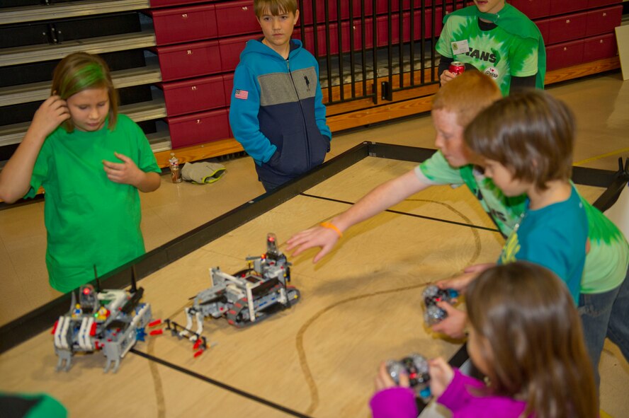 Children participated in the robotic games during the FIRST Lego League at the Tays Center in Alamogordo, N.M., Jan. 24, 2015. Air Force Diversity Operations Division develops annual outreach programs that focus on all facets of diversity with specific emphasis on strategic capabilities such as language skills, cross-cultural competencies, and Science, Technology, Engineering, and Mathematics (STEM) competencies. (U.S. Air Force photo by Staff Sgt. E’Lysia A. Wray/Released)