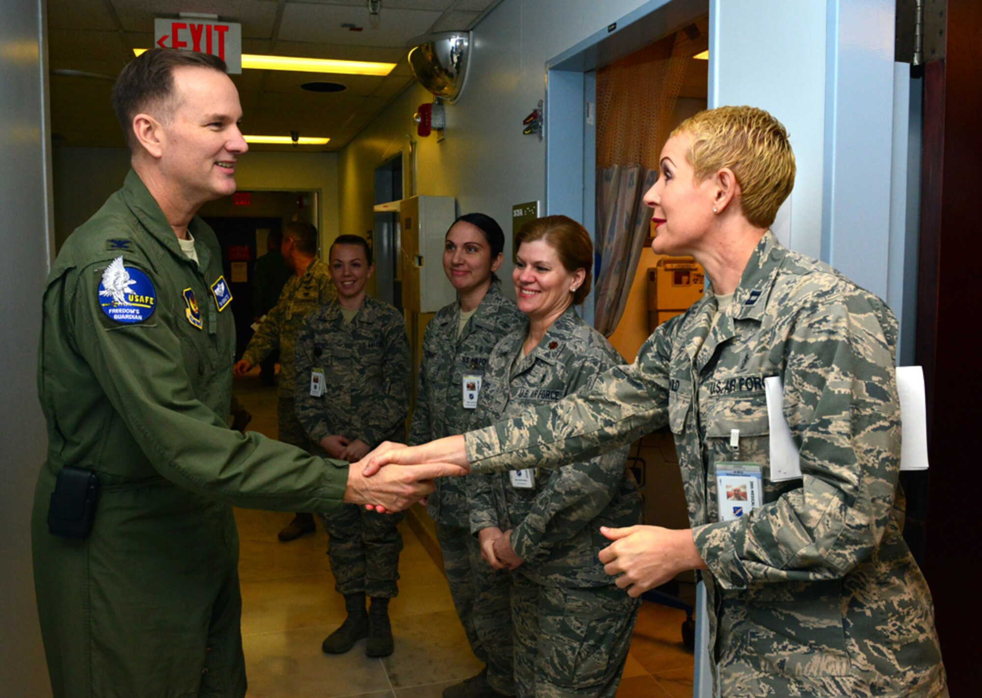 Capt. Elaina Wild, 39th Medical Operations Squadron family medicine physician, welcomes Col. Timothy Robinette, U.S. Air Forces in Europe and Air Forces Africa command surgeon, during a one-day 39th Medical Group visit Jan. 22, 2015, at Incirlik Air Base, Turkey. As command surgeon, Robinette advises and represents the USAFE-AFAFRICA commander on all aspects of the medical service mission. (U.S. Air Force photo by Senior Airman Michael Battles/Released)