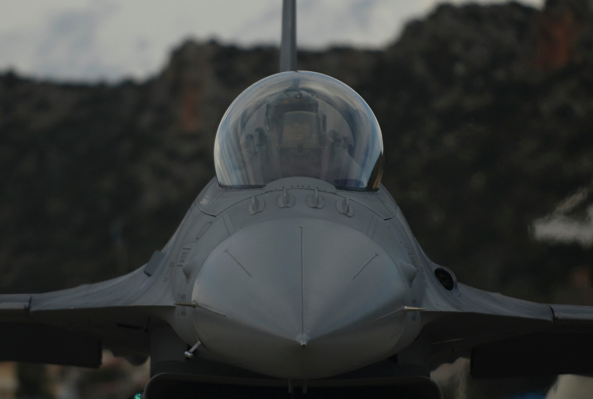 A U.S. Air Force pilot from the 480th Expeditionary Fighter Squadron taxis an F-16 Fighting Falcon fighter aircraft during a flying training deployment on the flightline at Souda Bay, Greece, Jan. 27, 2015. The 480th EFS participated in the training alongside Hellenic air force pilots from the 340th and 343rd Fighter Squadrons. (U.S. Air Force photo by Staff Sgt. Joe W. McFadden/Released)