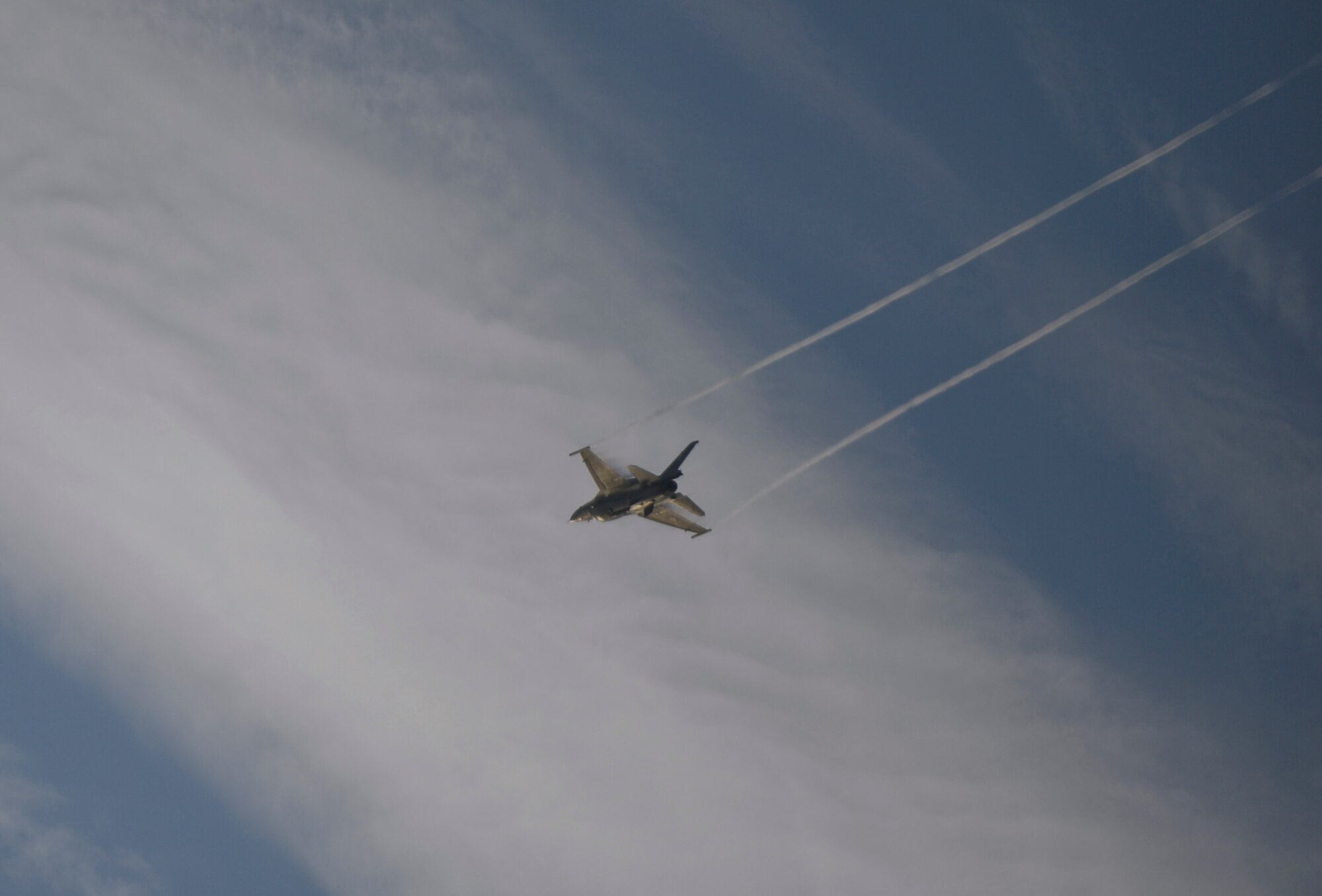 A Hellenic air force Team Zeus F-16 Fighting Falcon Demo aircraft assigned to the 340th Fighter Squadron performs aerobatic maneuvers during training over the flightline at Souda Bay, Greece, Jan. 27, 2015. Team Zeus, the HAF's F-16 demonstration team, consists of pilots from the 340th and 343rd Fighter Squadrons stationed at Souda Bay. (U.S. Air Force photo by Staff Sgt. Joe W. McFadden//Released)
