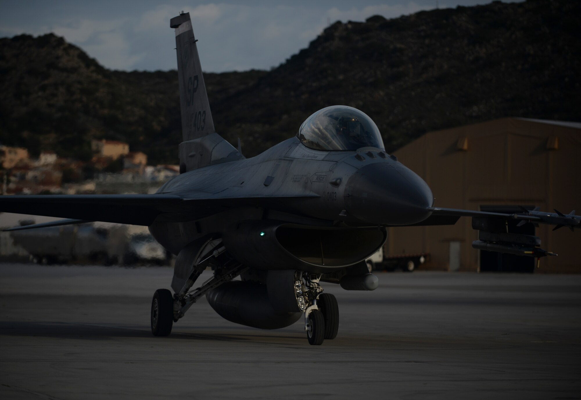 A U.S. Air Force pilot from the 480th Expeditionary Fighter Squadron taxis an F-16 Fighting Falcon fighter aircraft during a flying training deployment on the flightline at Souda Bay, Greece, Jan. 27, 2015. The aircraft participated in multiple flying sorties and air combat maneuvers between the Greek and U.S. Air Forces as part of the training.  (U.S. Air Force photo by Staff Sgt. Joe W. McFadden/Released)