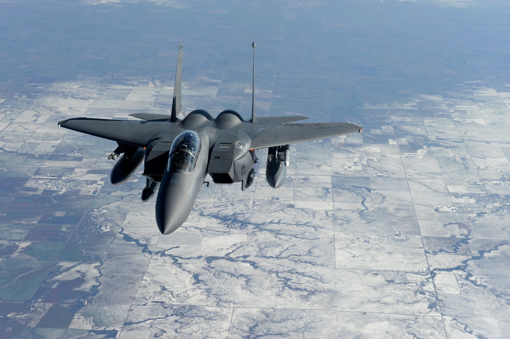 An F-15E Strike Eagle assigned to the 4th Fighter Wing makes its way to Nellis Air Force Base, Nevada, in support of Red Flag 15-1, Jan. 23, 2015. Eight Strike Eagles from the 4th FW are participating in the exercise, which began Jan. 26. The 4th FW’s Strike Eagles will be performing a different role for this iteration of Red Flag by providing adversary support. During the exercise, they will be simulating hostile aircraft in numerous training scenarios that build in intensity and difficulty as the weeks go on. (U.S. Air Force photo/Airman 1st Class Aaron J. Jenne)