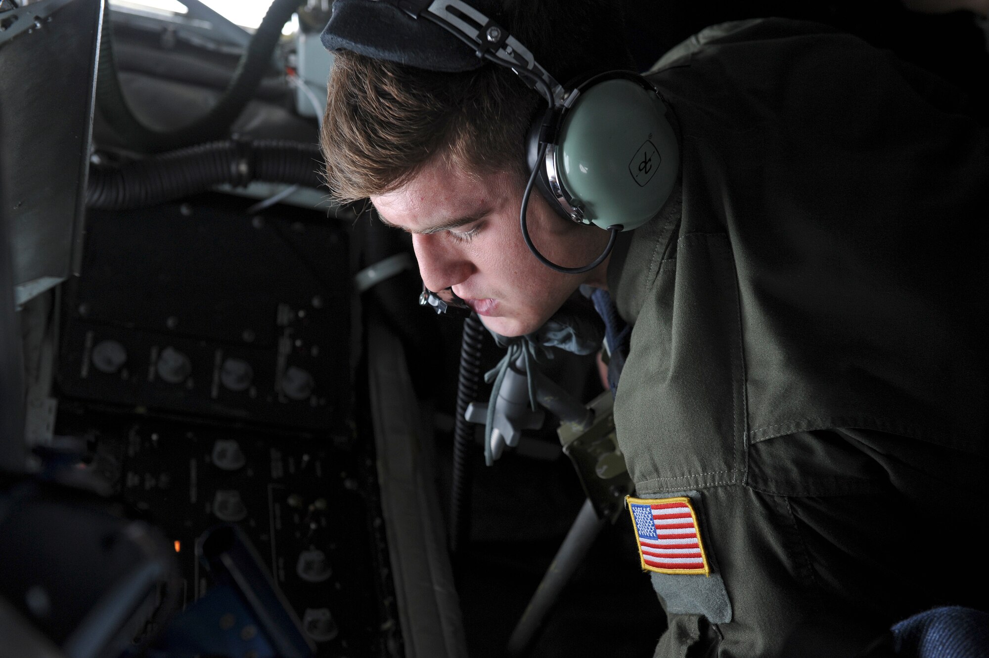 Airman 1st Class Drake Anderson, 911th Air Refueling Squadron boom operator, prepares to refuel an F-15E Strike Eagle assigned to the 4th Fighter Wing on its way to Nellis Air Force Base, Nevada, in support of Red Flag 15-1, Jan. 23, 2015. Eight Strike Eagles from the 4th FW are participating in the exercise, which began Jan. 26. (U.S. Air Force photo/Airman 1st Class Aaron J. Jenne)