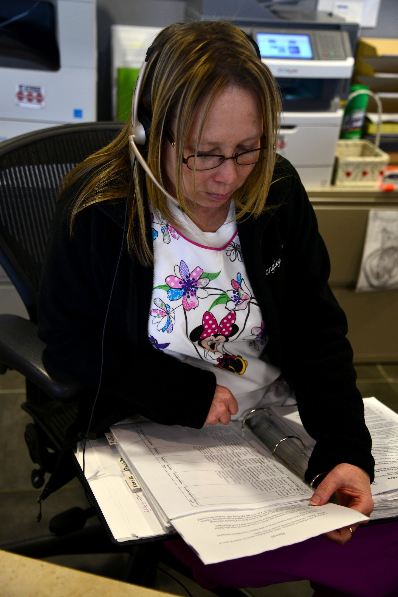 Anita Jackson, Veterinary Treatment Facility receptionist, schedules an appointment over the phone at Langley Air Force Base, Va., Jan. 27, 2015. The VTF offers appointments Monday through Thursday between the hours of 8 a.m. and 4 p.m., and provide a variety of services, including vaccinations and wellness exams. (U.S. Air Force photo by Senior Airman Aubrey White/Released)