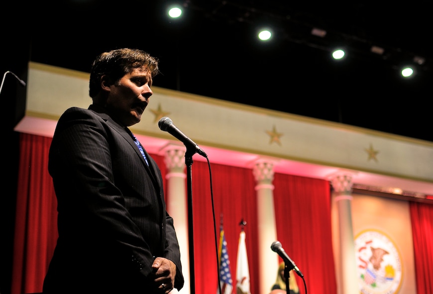 Jeffrey P. Mattsey, baritone with The Metropolitan Opera company in New York, performs with the Illinois National Guard's 144th Army Band and 566th Air Force Band at the inauguration ceremony of Governor-elect Bruce Rauner in Springfield, Ill., Jan. 12, 2015. Mattsey is the brother of U.S. Air Force Master Sgt. Douglas A. Mattsey (not pictured), a regional band craftsman with the 566th Air Force Band, who played the tuba and also sang at the ceremony. (U.S. Air National Guard photo by Staff Sgt. Lealan Buehrer/Released)