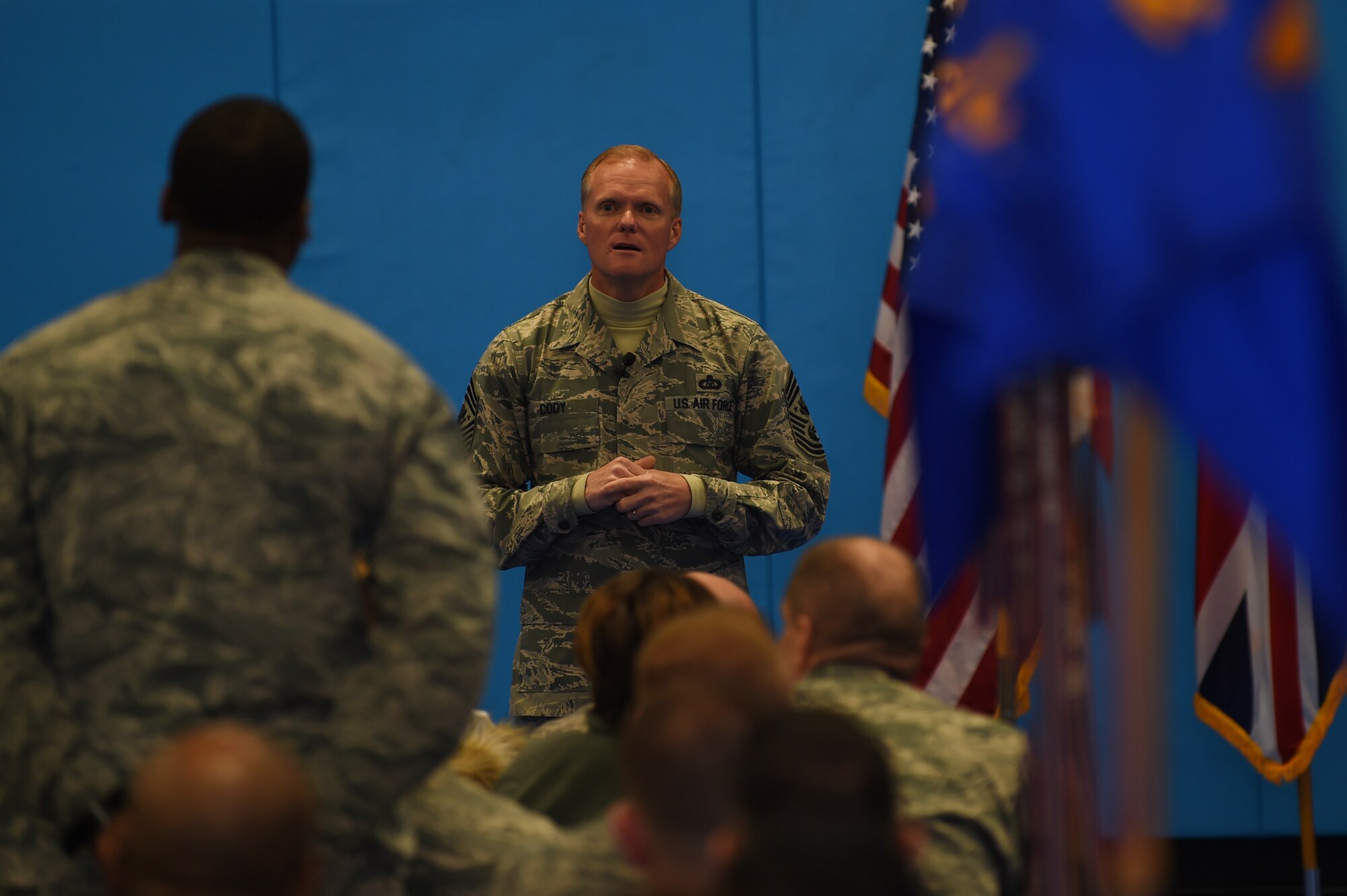Chief Master Sgt. of the Air Force James A. Cody listens to a question from an Airman during an all-call at RAF Croughton, England, Jan. 28, 2015. Cody encouraged Airmen to ask any and all questions they had on their minds. (U.S. Air Force photo by Staff Sgt. Jarad A. Denton/Released)