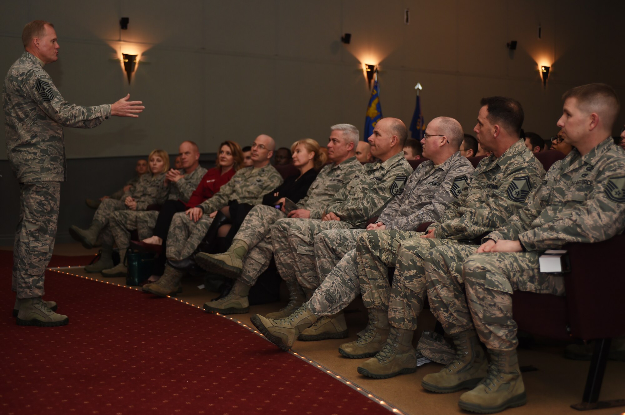 Chief Master Sgt. of the Air Force James A. Cody discusses current and future U.S. Air Force challenges with Airmen of the 501st Combat Support Wing during an all-call at RAF Alconbury, England, Jan. 27, 2015. Cody welcomed Airmen to ask any and all questions they had, both during and after the all-call. (U.S. Air Force photo by Staff Sgt. Jarad A. Denton/Released)