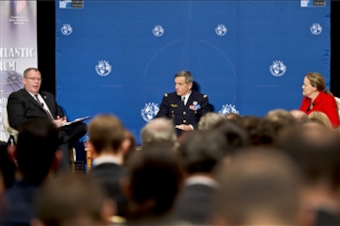 Deputy Defense Secretary Bob Work, left, responds to questions as he participates in a panel with Michele Flournoy, cofounder and CEO of the Center for a New American Security, and French Air Force Gen. Jean-Paul Palomeros, a NATO commander, at the center's Transatlantic Forum 2015 in Washington, D.C., Jan. 28, 2015.