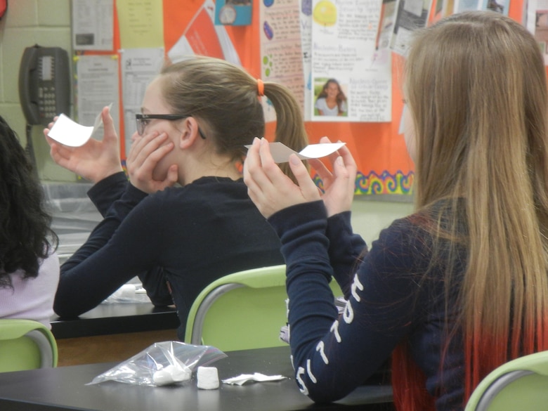 Students learn what tension and compression is and why it's important to know when designing a building.  They learned with the use of objects including index cards and marshmellows. 
