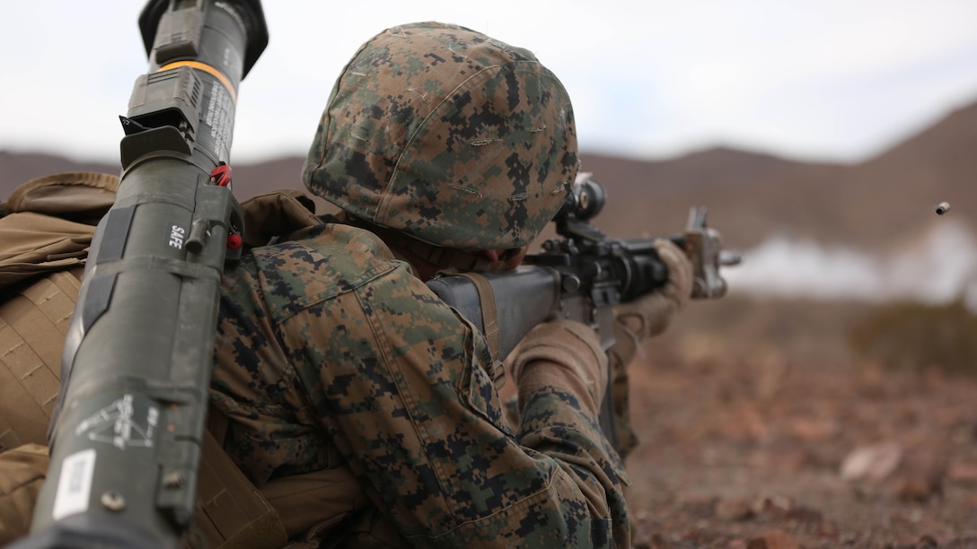 Lance Cpl. Netanel Frankel, rifleman, Company I, 3rd Battalion, 7th Marine Regiment, a native of Chicago, Ill., fires at a target during the offensive assault at the Morgan’s Well training during the Marine Corps Combat Readiness Evaluation Exercise, Jan. 18, 2015.