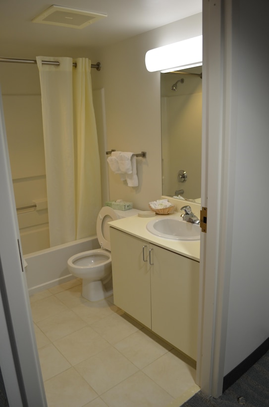 A recently renovated efficiency room at the Crossroads Inn aboard Marine Corps Base Quantico features new carpet, paint, furniture, curtains, artwork and bedding in an updated color scheme and design.