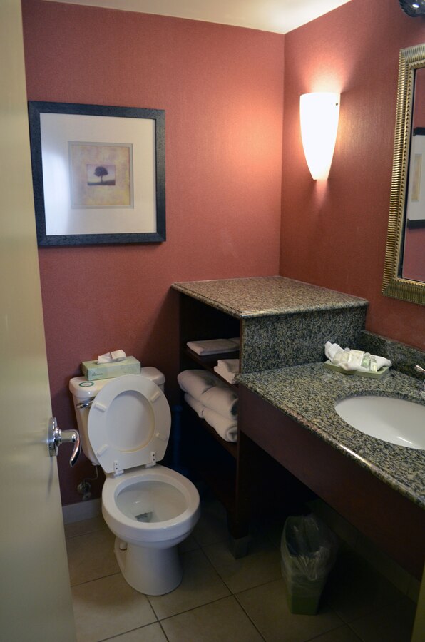 A recently renovated efficiency room at the Crossroads Inn aboard Marine Corps Base Quantico features new carpet, paint, furniture, curtains, artwork and bedding in an updated color scheme and design.