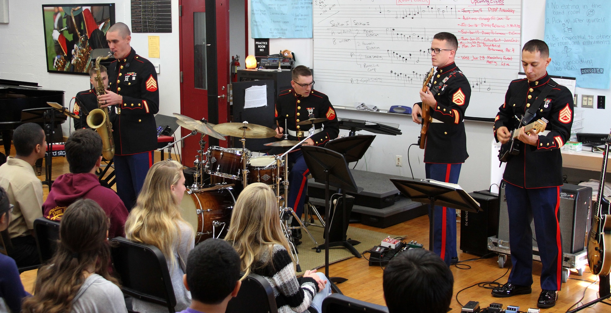 SAN DIEGO -  Sgt. Tyler Van Dam, a saxophonist and a Moore Park, Calif., native, performs at Point Loma High School Jan. 27 in San Diego during a
Marine Band San Diego jazz combo high school tour Jan. 26 through 30. The musical combo is touring high schools throughout Marne Corps Recruiting
Station San Diego's area of operation and teaching students about Marine Corps musician enlistment opportunities. Each performance lasts
approximately two hours and encompasses a variety of song styles including original pieces by the musicians.(U.S. Marine Corps photo by Sgt. Kirsop/Released)
