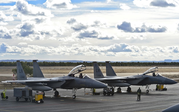 Two F-15C Eagles from the 493rd Fighter Squadron are checked prior to takeoff during the Tactical Leadership Program Jan. 20, 2014, at Albacete Air Base, Spain. The 493rd FS from Royal Air Force Lakenheath, England, participated in the multi-national program, which develops key leadership and mission-planning skills needed for NATO operations. Members of the 493rd FS are recipients of the 2014 Raytheon Trophy, being recognized as the top fighter squadron in the Air Force. (U.S. Air Force photo/Staff Sgt. Stephanie Mancha)