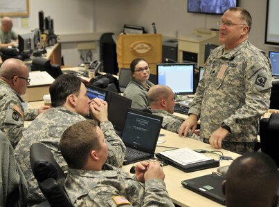 Lt. Col. Jeffery J. Files, acting commander of 66th Troop Command, Mississippi Army National Guard, which is acting as high command during Allied Spirit I, briefs the unit at the Joint Multinational Readiness Center in Hohenfels, Germany. The event included more than 2,000 participants from Canada, Hungary, the Netherlands, the United Kingdom and the United States and exercises interoperability with NATO allies.