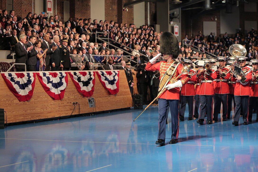 The U.S. Marine Band passes in review in front of 24th Secretary of Defense Chuck Hagel, President Barack Obama, Vice President Joseph Biden, and Chairman of the Joint Chiefs of Staff General Martin Dempsey at Conmy Hall on Joint Base Myer-Henderson Hall in Virginia, on Jan. 28, 2015. (U.S. Marine Corps photo by Staff Sgt. Brian Rust/released)