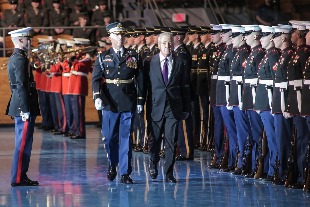 Secretary of Defense Chuck Hagel inspects the troops during his farewell tribute at Conmy Hall on Joint Base Myer-Henderson Hall in Virginia, on Jan. 28, 2015. (U.S. Marine Corps photo by Staff Sgt. Brian Rust/released)