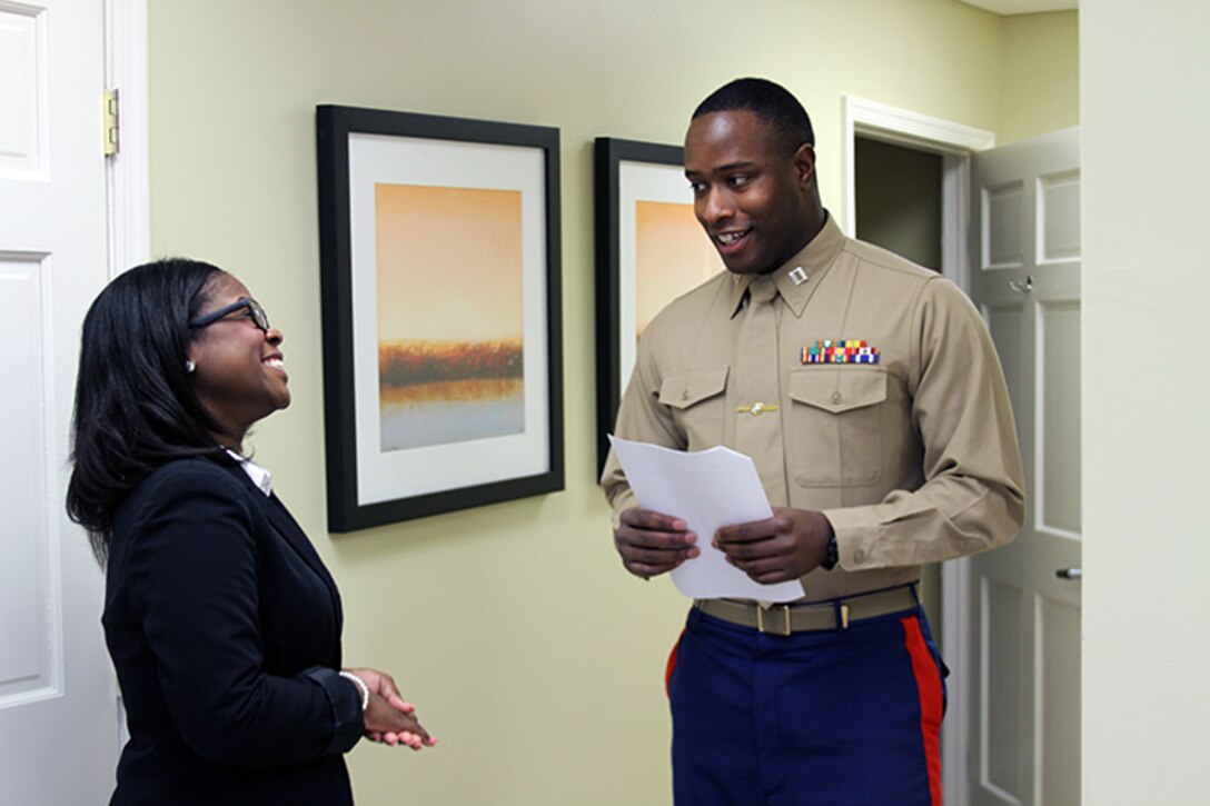 U.S Marine Corps Capt. Devin Claridy, the Officer Selection Officer for Officer Selection Station Norfolk and an Akron, Ohio native, explains the rules of a leadership exercise to Alyssa Lee, a sophomore studying mass communications at Virginia Union University, during the Marine Corps Leadership Seminar held at the Gloucester Institute in Virginia, Jan. 24, 2015. The seminar teaches Marine Corps leadership principles to college students in an effort to foster a positive image of the Marine Corps and to prepare the nation’s future leaders by imparting values and lessons learned over the Corps’ long and illustrious history. (U.S. Marine Corps photo by Sgt. Aaron Diamant/released)

