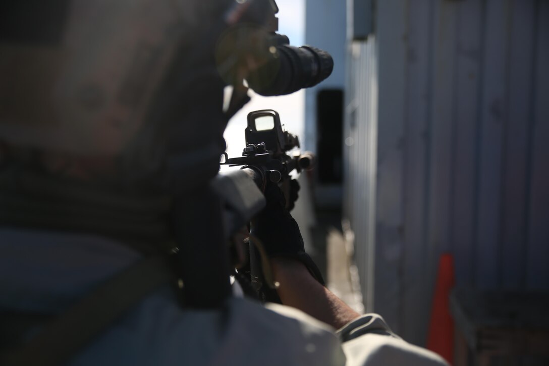 A Critical Skills Operator with Bravo Company, 1st Marine Special Operations Battalion, U.S. Marine Corps Forces, Special Operations Command, searches and clears a target vessel during Visit, Board, Search and Seizure training near Naval Base Coronado, Calif., Jan. 15. (Official Marine Corps photo by Sgt. Donovan Lee/released)