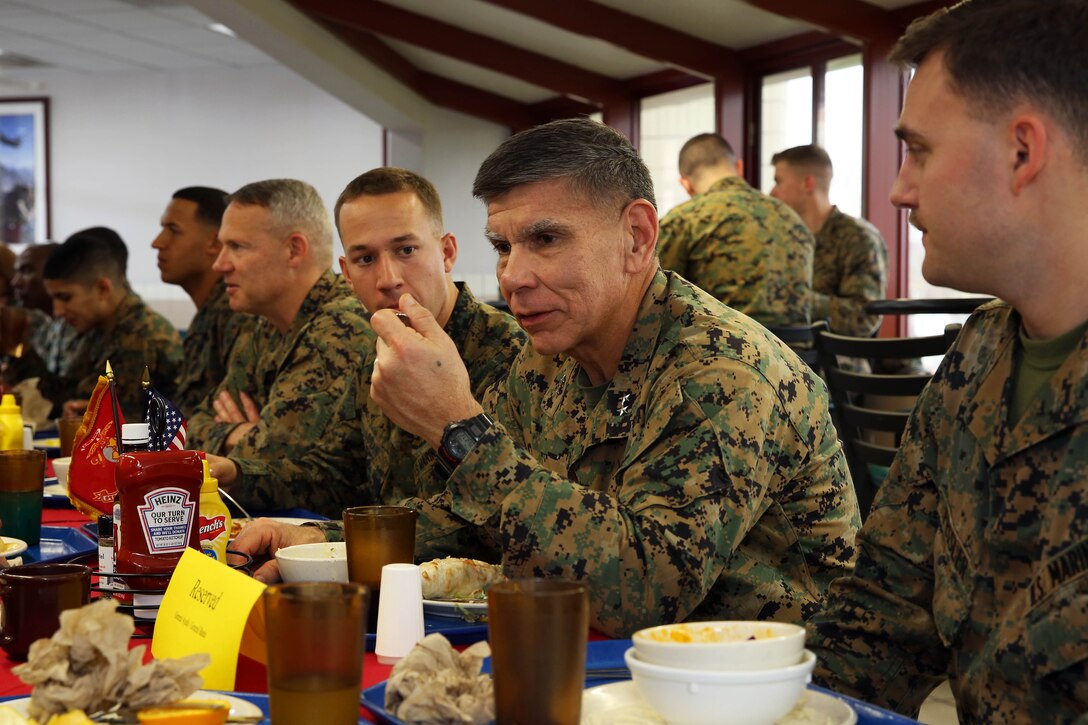 Maj. Gen. Juan G. Ayala, center-right, eats with Marines at the 24 Area Chow Hall during a visit to Camp Pendleton, Jan. 29.

Ayala is the Commanding General of Marine Corps Installations Command.