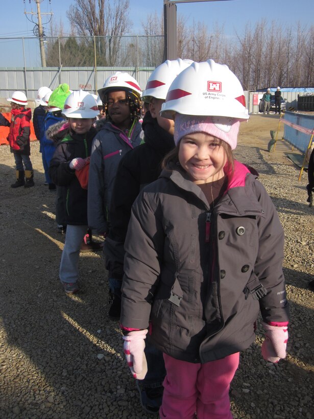 Osan American Elementary student Bianca Torelli and her classmates visit the future site of their new school Jan. 20 as part of a tour given by the U.S. Army Corps of Engineers Far East District central resident office.