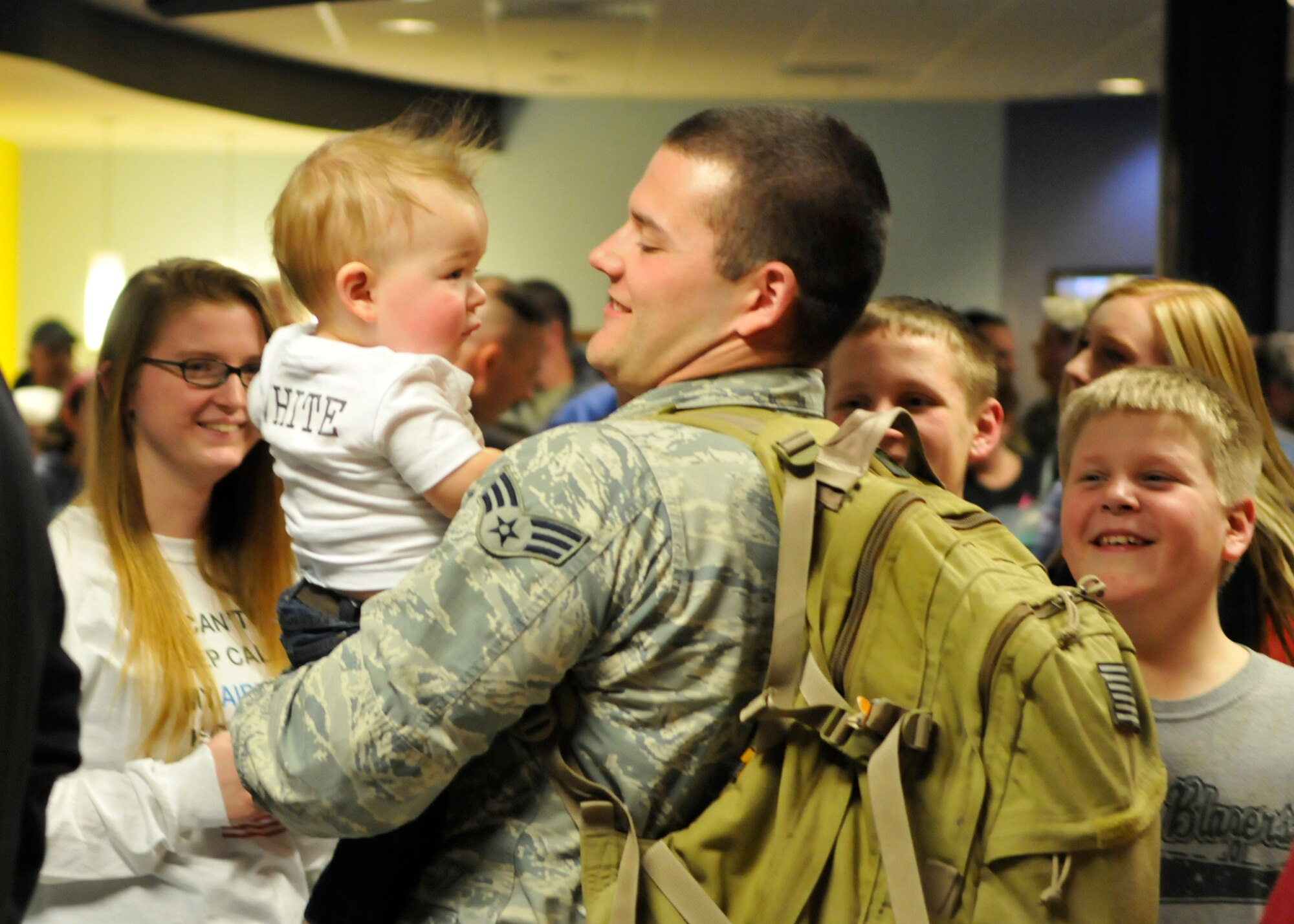 FORT WAYNE AIR NATIONAL GUARD BASE, Ind. – The 122nd Fighter Wing welcomed home more than two-dozen members from the 122nd Security Forces Squadron, as they returned from a six-month deployment in support of Operation Enduring Freedom, January 23, 2015 at the Fort Wayne International Airport.  Twenty-six Blacksnakes mobilized for this deployment and were assigned to the 379th Expeditionary Security Forces Squadron at Al Udeid Air Base, Qatar. The group spent one month in San Antonio conducting combat preparation, then transitioned to Qatar for six months. 