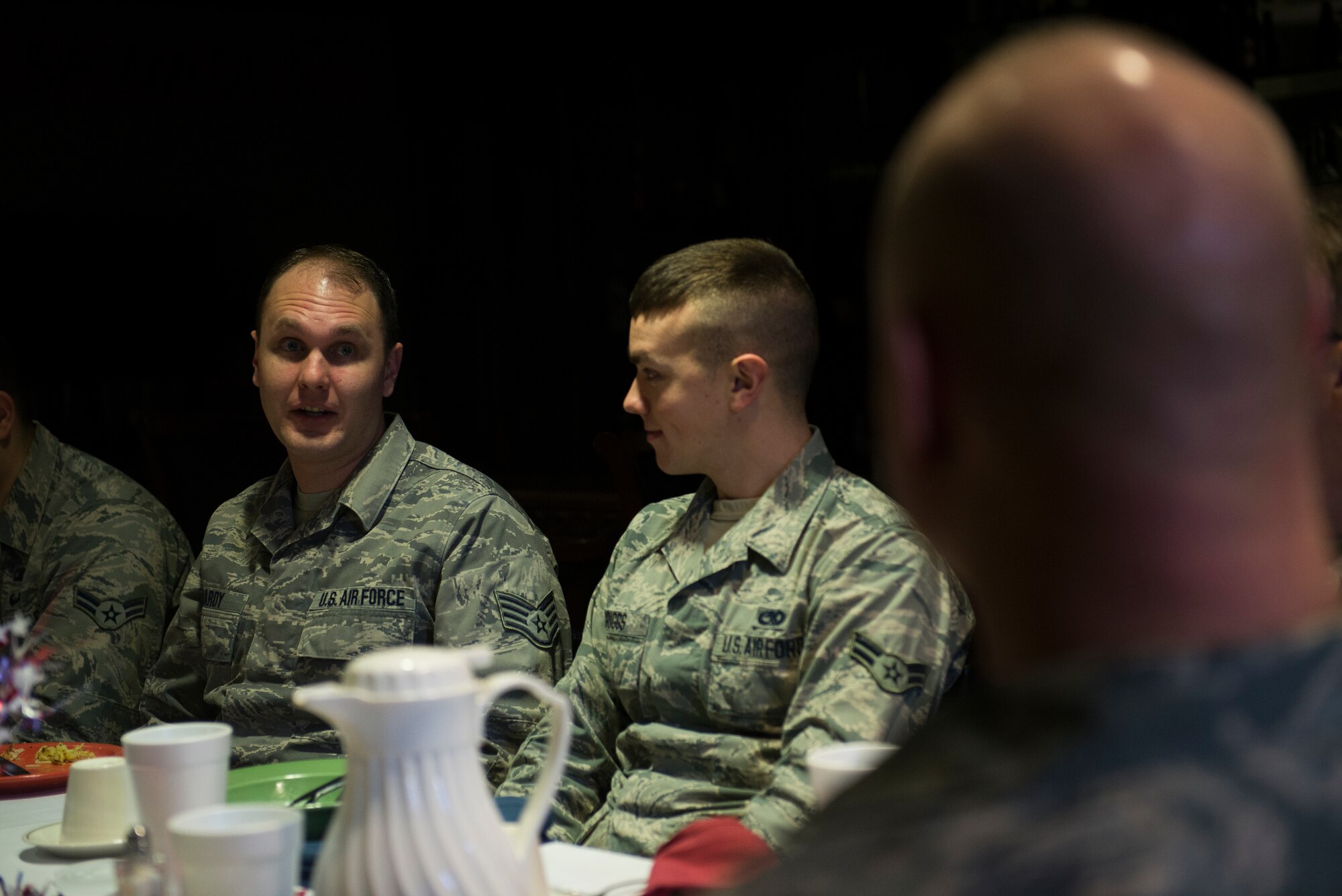 U.S. Air Force Staff Sgt. Eric Hardy, left, 23d Equipment Maintenance Squadron munitions scheduler, introduces Airman 1st Class John Griggs, center, 23d Equipment Maintenance Squadron crew member, to Chief Master Sgt. Scott Fuller, Ninth Air Force command chief, during breakfast  Jan. 29, 2015, at Moody Air Force Base, Ga. Fuller spoke to Moody Airmen about the importance of supervisors getting to know their Airmen. (U.S. Air Force photo by Airman 1st Class Dillian Bamman/Released)