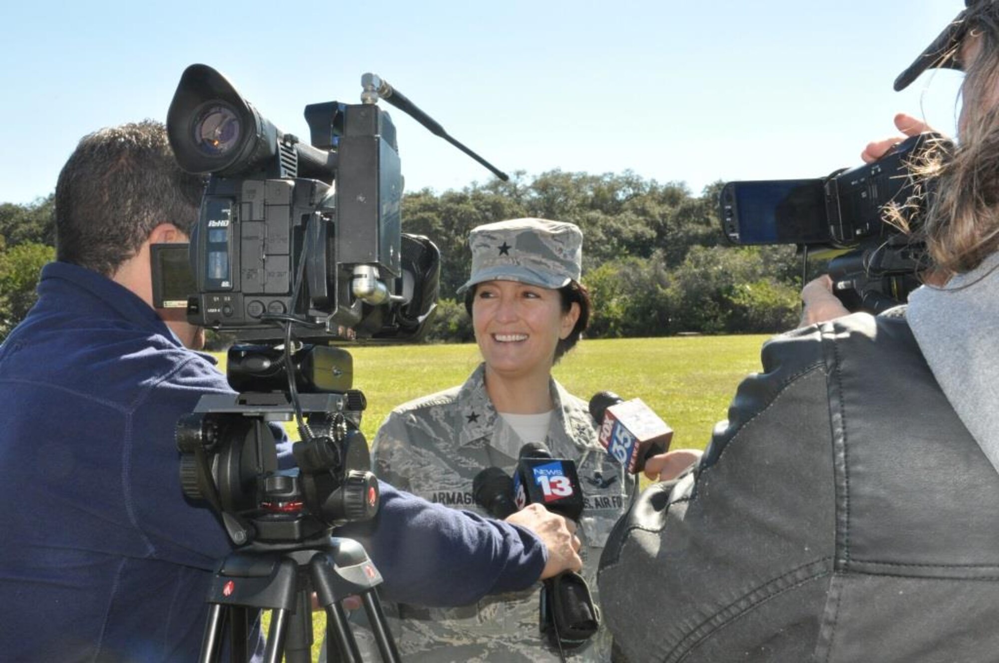 Local media members interview Brig. Gen. Nina Armagno, commander, 45th Space Wing, about the weather-bot Jan. 27 at Cape Canaveral Air Force Station, Fla. The robot helps members of the 45th Weather Squadron release weather balloons without risking human life when lightning is too close. (Photo by Chris Calkins)
