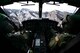 1st Lt. Greg Johnston, left, and Capt. RJ Bergman, both 40th Helicopter Squadron rescue pilots, fly their UH-1N Huey over a mountain range Jan. 27, 2015, near Malmstrom Air Force Base, Mont. The flight took the crew over a variety of terrain and altitudes, from flatlands to valleys and mountains. (U.S. Air Force photo/ Airman 1st Class Dillon Johnston)