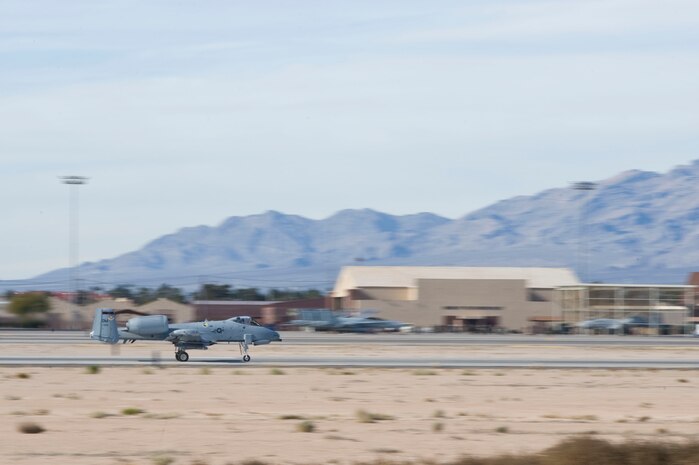 A flight of four A-10 Thunderbolt IIs assigned to the 355th Operations Group, Davis-Monthan Air Force Base, Ariz., line up on the flightline during Green Flag-West 15-03 at Nellis Air Force Base, Nev., Jan. 26, 2015. Green Flag-West 15-03 is a joint close air support exercise with the U.S. Army taking place in the National Training Center at Fort Irwin, Calif. (U.S. Air Force photo by Airman 1st Class Mikaley Towle)