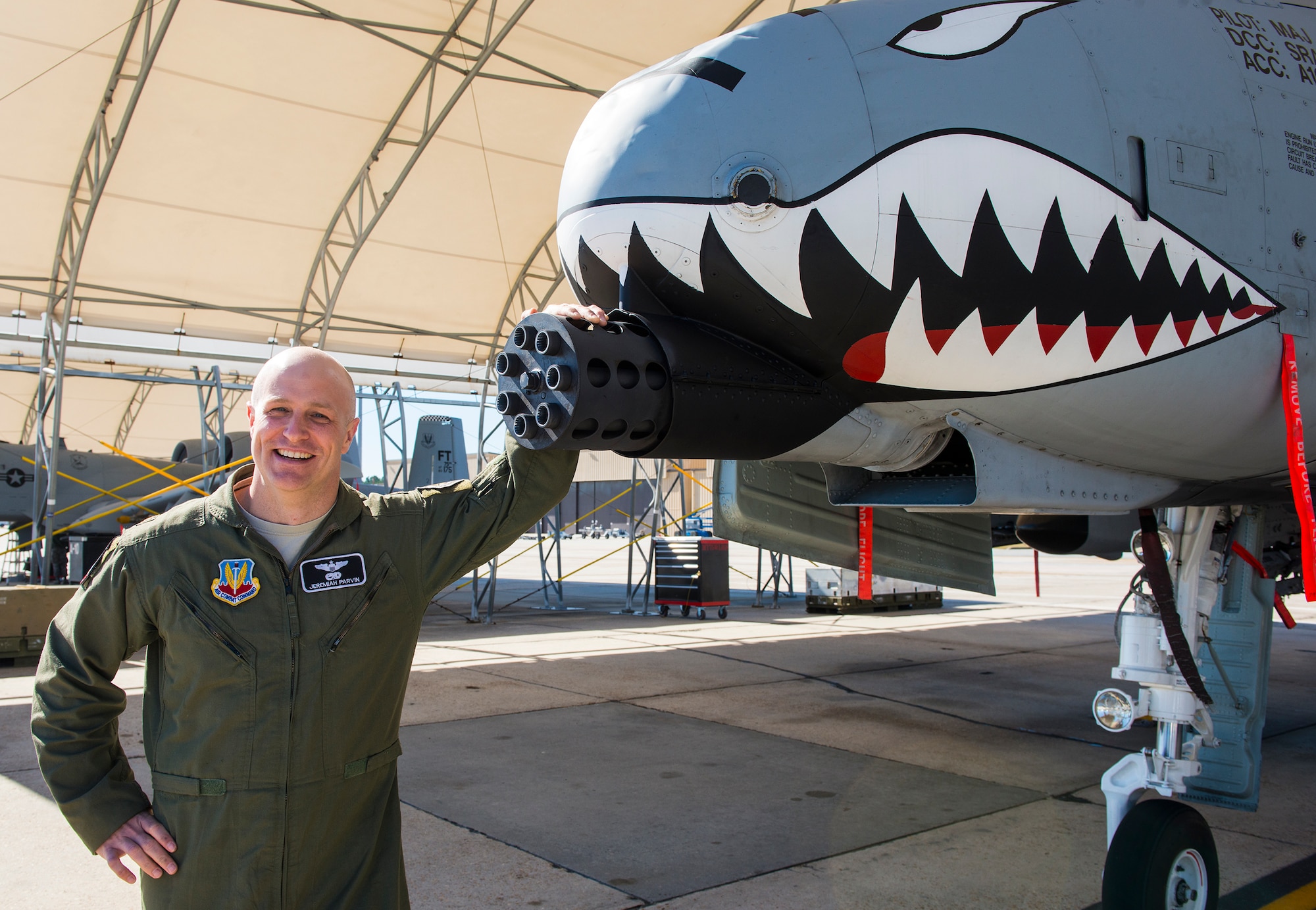 U.S. Air Force Maj. Jeremiah ‘Bull’ Parvin, 75th Fighter Squadron director of operations, poses for a photo in front of his A-10C Thunderbolt II Jan. 28, 2015, at Moody Air Force Base, Ga. Parvin was awarded the Distinguished Flying Cross with Valor Jan. 29,2015, for his selfless and heroic actions that he displayed seven years earlier during a deployment to Afghanistan. (U.S. Air Force photo by Airman 1st Class Ceaira Tinsley/Released)
