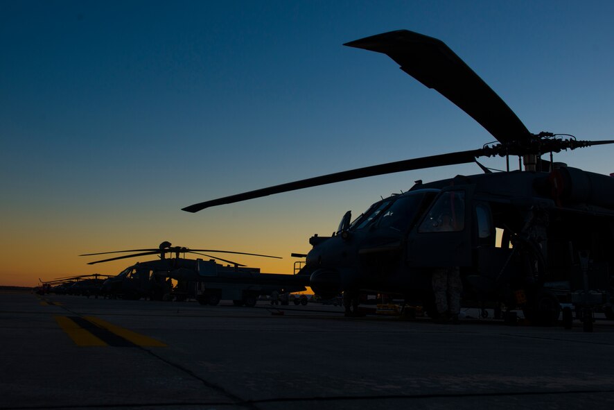 HH-60G Pave Hawks rest on the flightline during a short-notice deployment exercise Jan. 28, 2015, at Moody Air Force Base, Ga. The 723d Aircraft Maintenance Squadron fully prepared three HH-60s for loading onto simulated C-17 Globemaster IIIs. (U.S. Air Force photo by Airman 1st Class Dillian Bamman/Released)