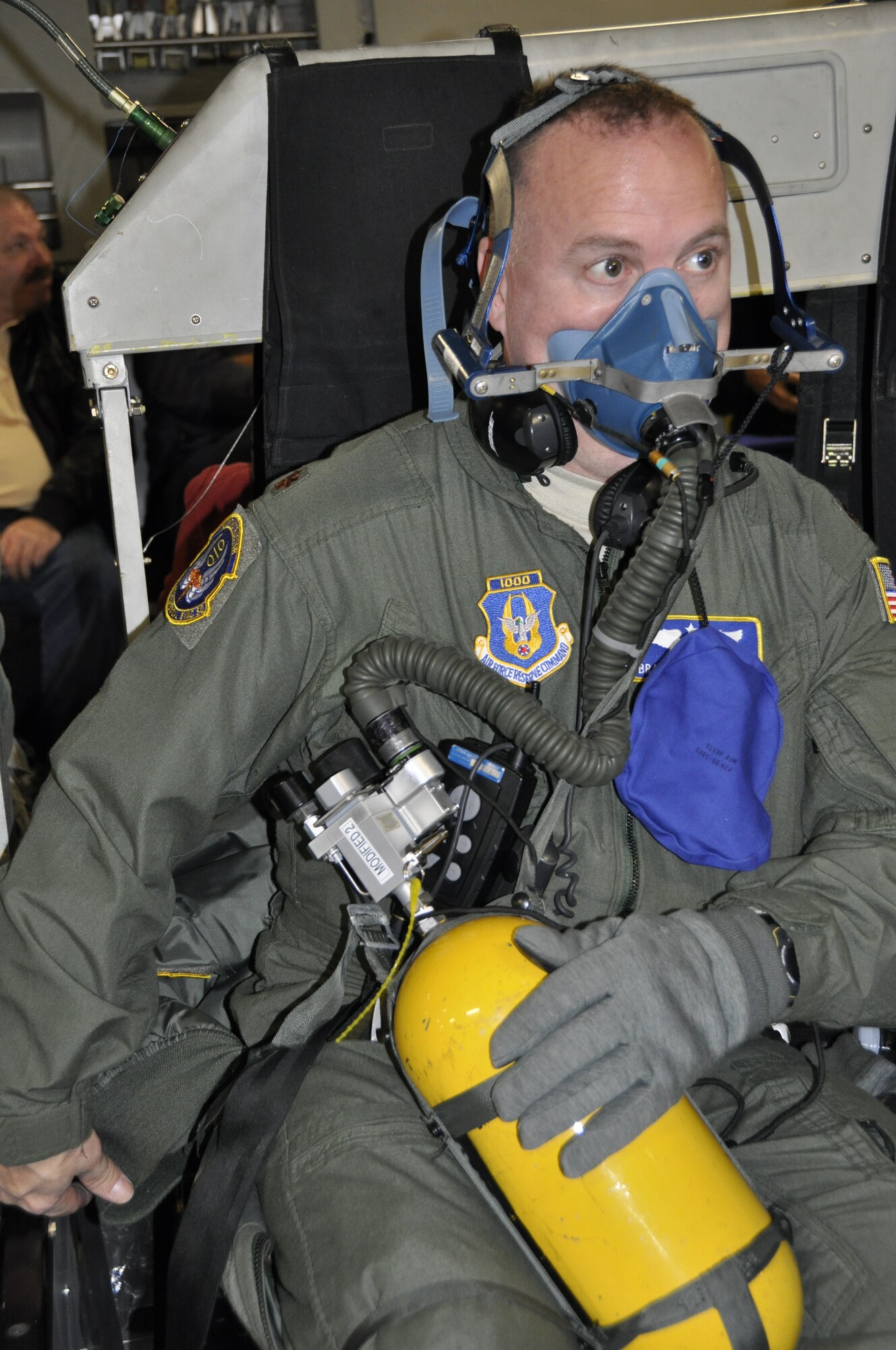 Maj. Bradford Dungan is equipped with oxygen to handle the simulated rapid decompression exercise the 514th Aeromedical Evacuation Squadron team conducted Jan. 17 during the first leg of a 3-day training mission. The Reserve unit uses simulated flight and medical scenarios to ensure medical personnel stay current skill-wise and are prepared to handle a multitude of aerial situations. (Air Force photo/Master Sgt. Donna T. Jeffries)