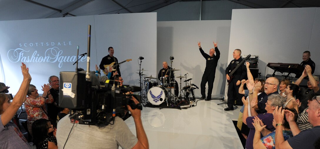 Max Impact, the U.S. Air Force premier rock band, records a 45-second rendition of the Entertainment Sports and Programming Network Sport Center’s theme song for their televised, featured performance at Fan Fest in Scottsdale, Az., Jan. 28, 2015. The week-long entertainment, food and fashion event is home to ESPN’s live broadcast for Super Bowl XLIX. (U.S. Air Force photo/ Senior Airman Nesha Humes)