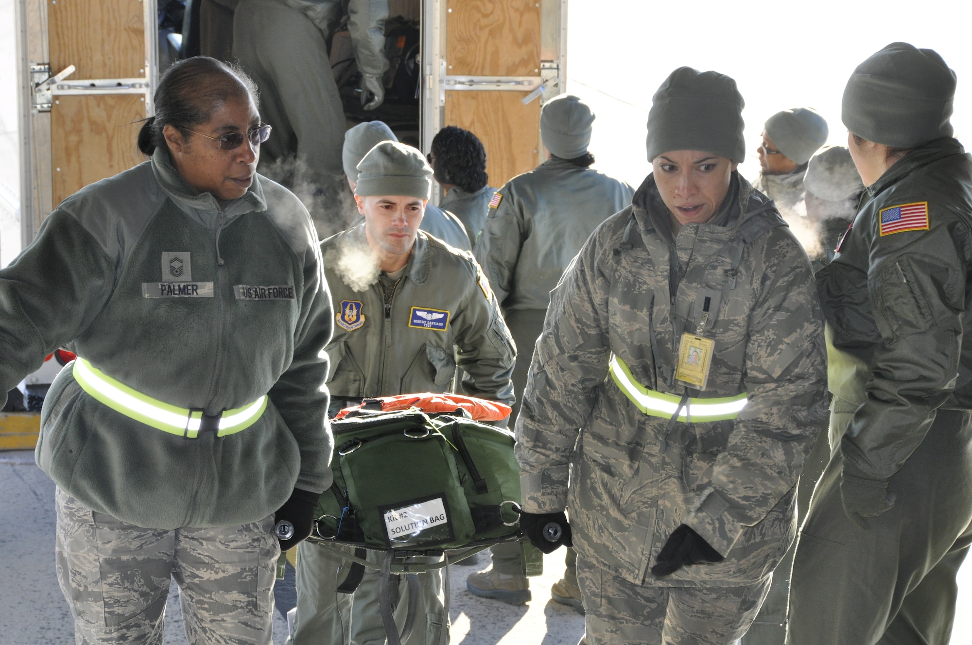 All hands on deck as members of the 514th Aeromedical Evacuation Squadron prepare for a 3-day training mission on board a C-17 Globemaster, Jan. 17-19. Flight nurses, medical technicians and administrative assistants participated in several medical scenarios and received immediate feedback on their performance by their instructors. (Air Force photo/Master Sgt. Donna T. Jeffries) 