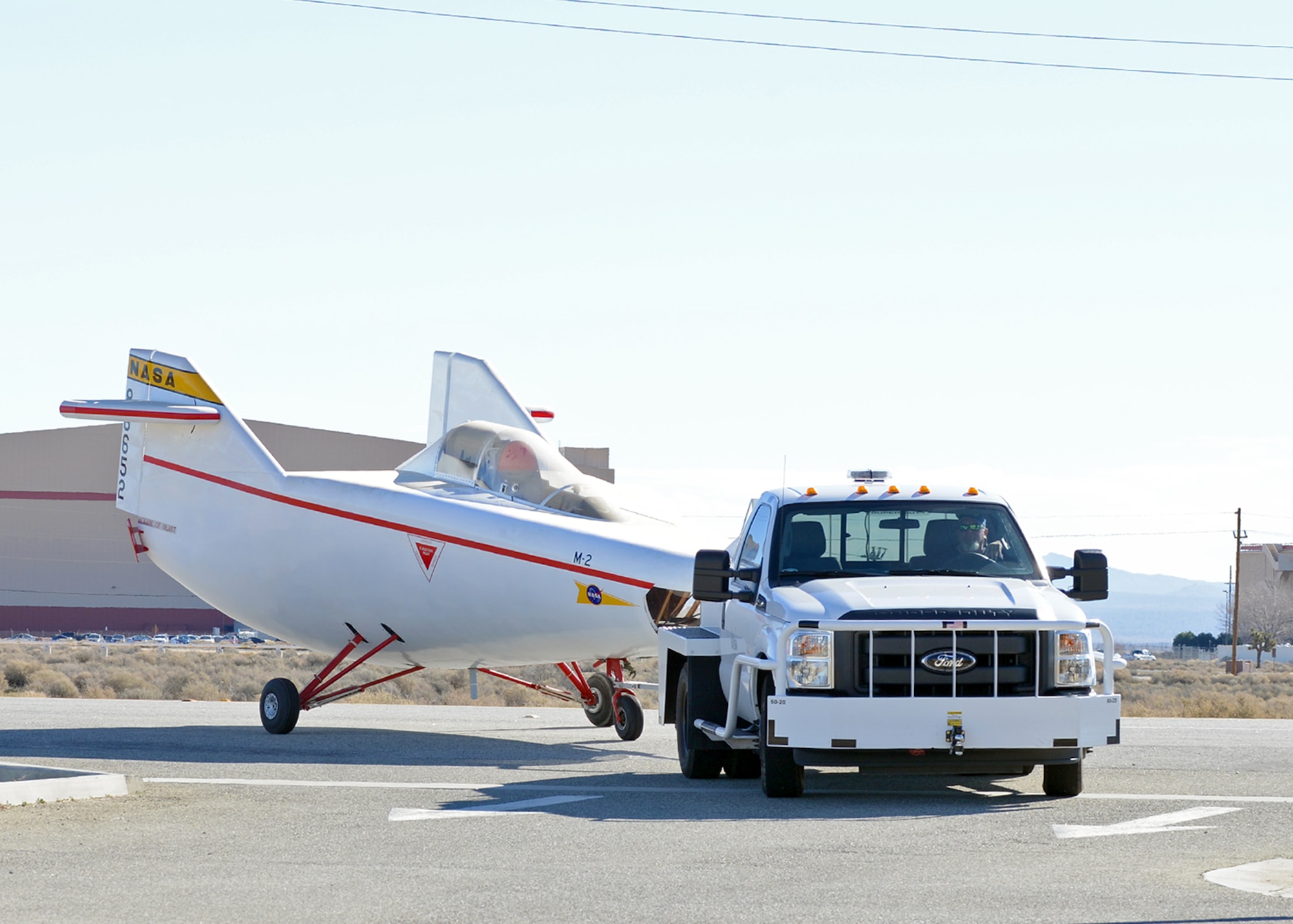 Air Force Flight Test Museum staff and volunteers, along with NASA Armstrong Flight Research Center personnel, collaborated to integrate NASA’s M2-F1 “Lifting Body” into the latest collection of AFFT Museum aircraft Jan. 23. (U.S. Air Force photo by Jet Fabara)