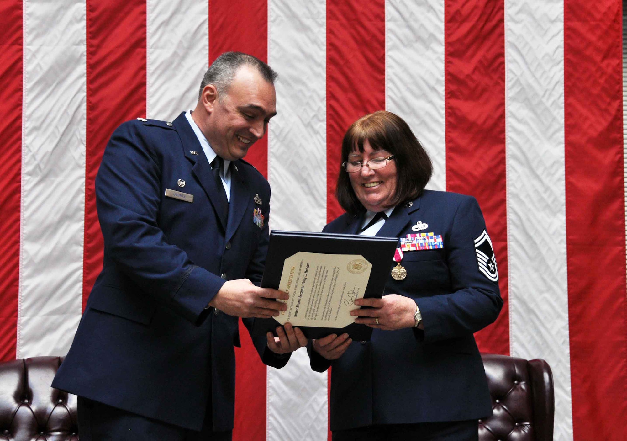 TRAVIS AIR FORCE BASE, Calif. -- Senior Master Sgt. Vicky L. Hedger, a propulsion superintendent with the 349th Maintenance Squadron, retired after almost 36 years of service, January 24, 2015. (U.S. Air Force photo/Staff Sgt. Cindy Alejandrez) 