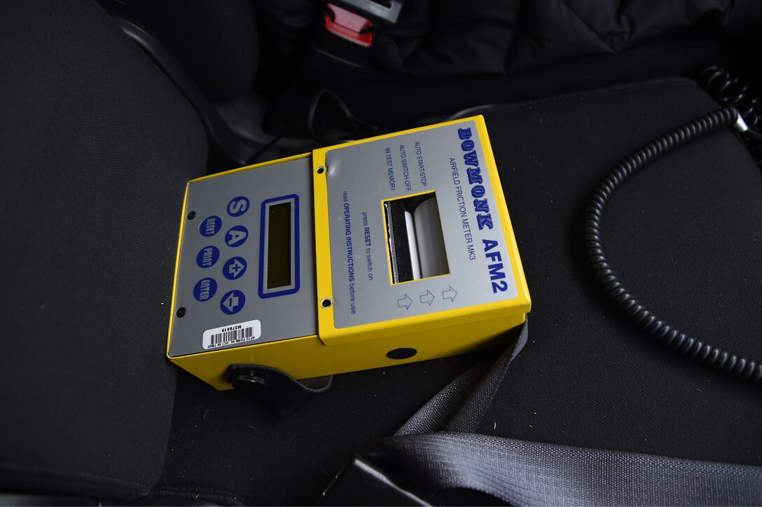 An air field friction meter, or Bowmonk, sits in the cab of a flight line truck on Joint Base Andrews, Jan. 26, 2015. Snow removal teams use Bowmonks to test the snow and ice on the runways, allowing them to coordinate the efforts of chemical dispensers, plows and brooms. (U.S. Air Force photo/ Airman 1st Class J.D. Maidens)