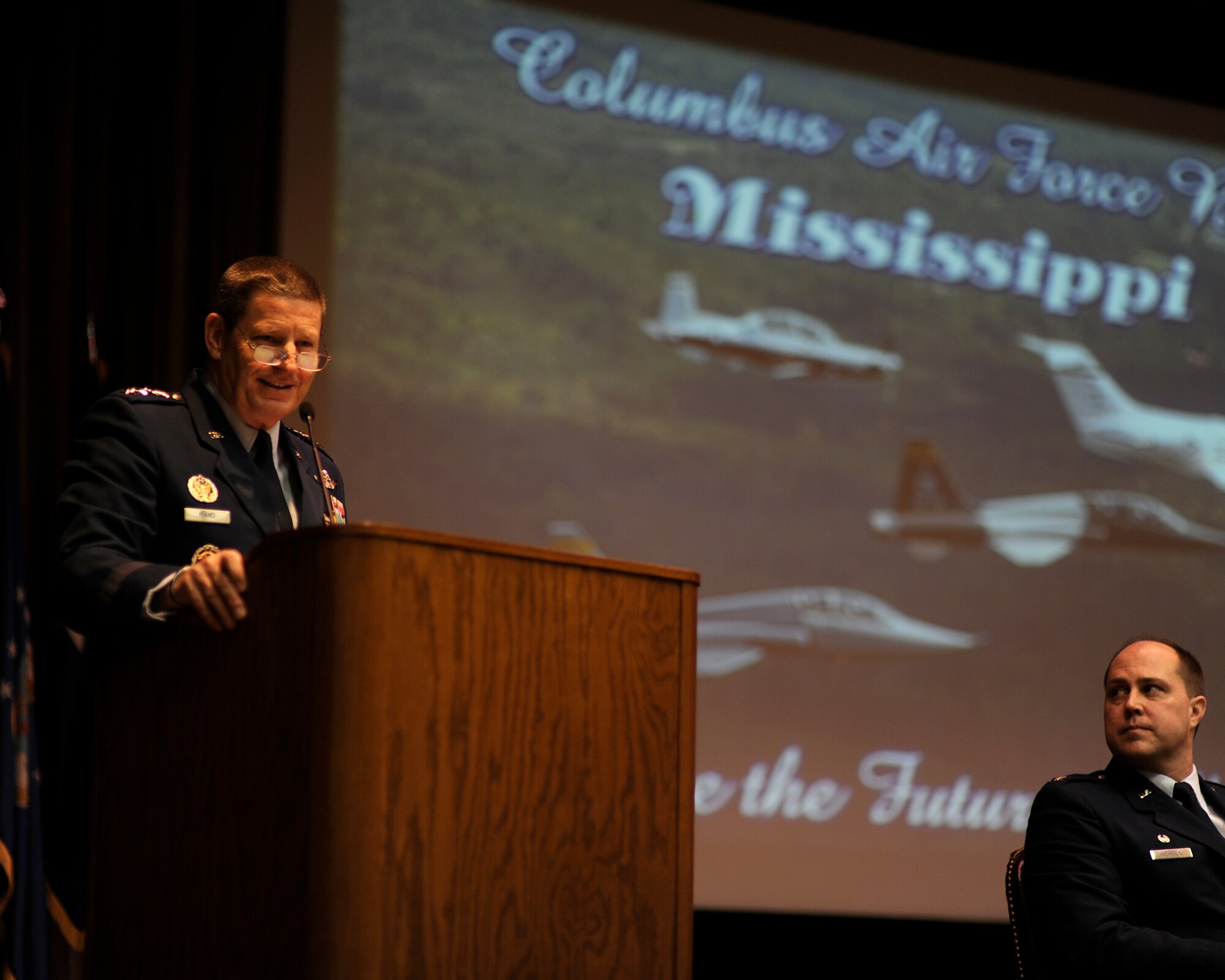 Gen. Robin Rand, Commander of Air Education and Training Command, speaks to Specialized Undergraduate Pilot Training Class 15-04 during their graduation ceremony Jan. 23, 2015, at Columbus Air Force Base, Miss. Rand and Chief Master Sgt. Gerardo Tapia, AETC Command Chief, visited Columbus AFB Jan. 22-23 to observe the mission and meet with Airmen. (U.S. Air Force photo/Elizabeth Owens)