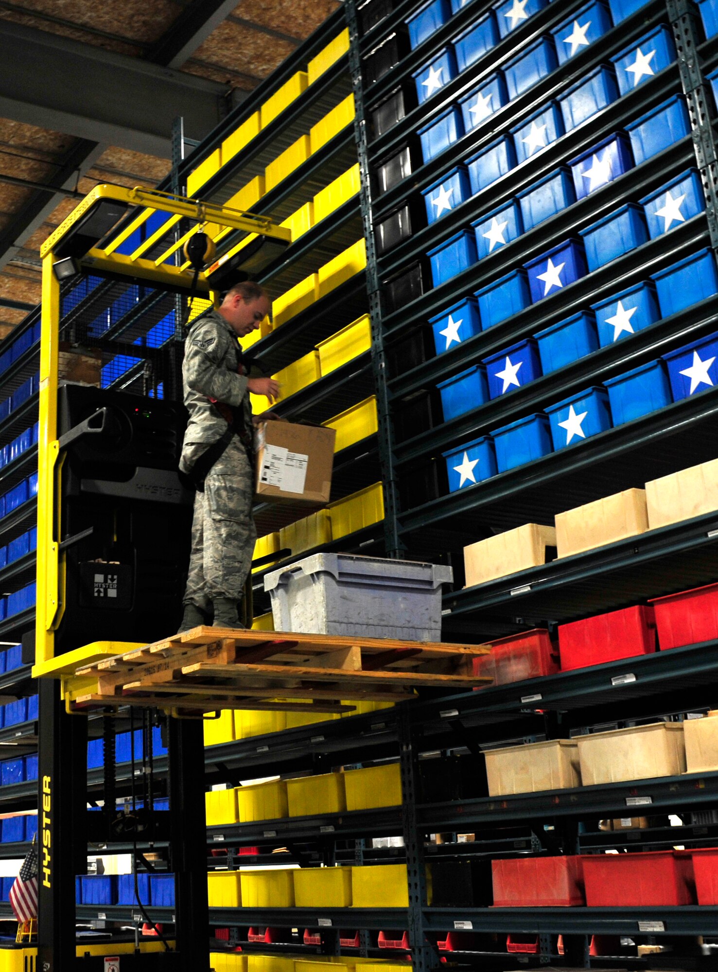 Senior Airman David Guay, of the 96th Logistics Readiness Squadron, operates a Hyster to retrieve a priority asset for the 96th Maintenance Squadron at a shipping and receiving facility on Eglin Air Force Base, Fla., Jan. 14.  The 96th Materiel Management Flight manages and maintains more 50,000 line items and 500,000 assets.  (U.S. Air Force photo/Ilka Cole)
