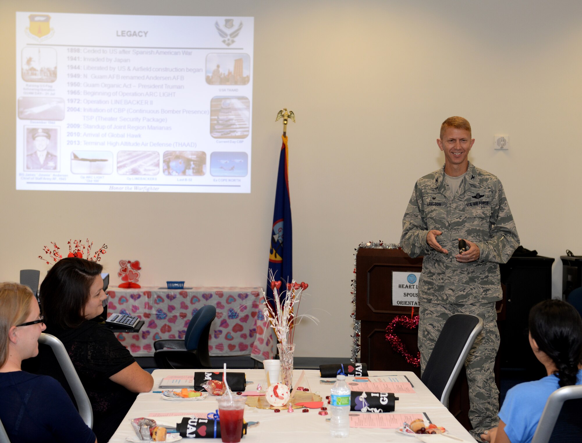 Col. Reid Langdon, 36th Operations Group commander, briefs Air Force spouses during the Heart Link Spouses Workshop Jan. 26, 2015, at Andersen Air Force Base, Guam. Heart Link is a program that helps strengthen Air Force families by informing Airmen’s spouses on the Air Force mission, customs, traditions, protocol and other support resources and services. (U.S. Air Force photo by Senior Airman Amanda Morris/Released) 